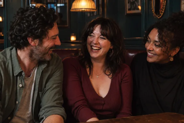 Friends laughing on a night out